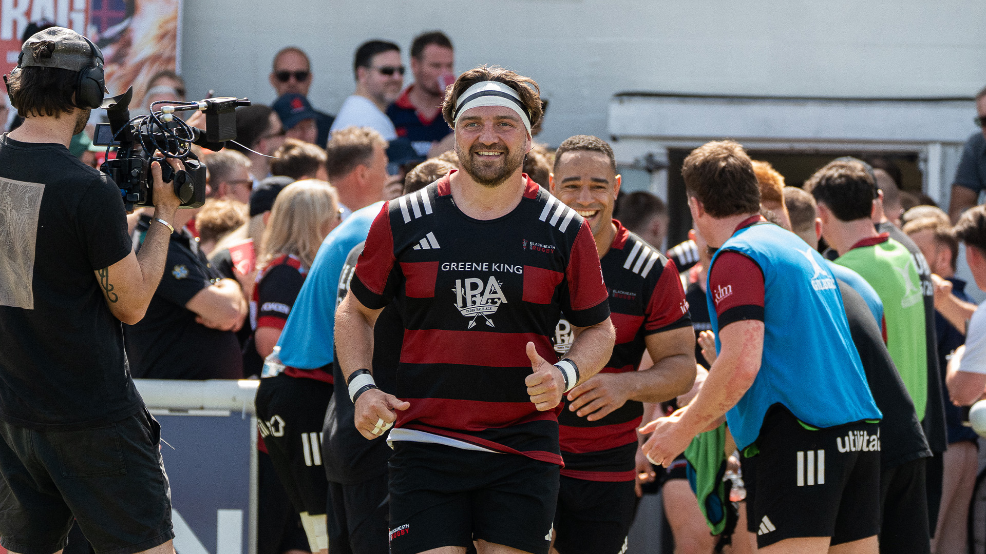 Billy Harding running out onto the pitch