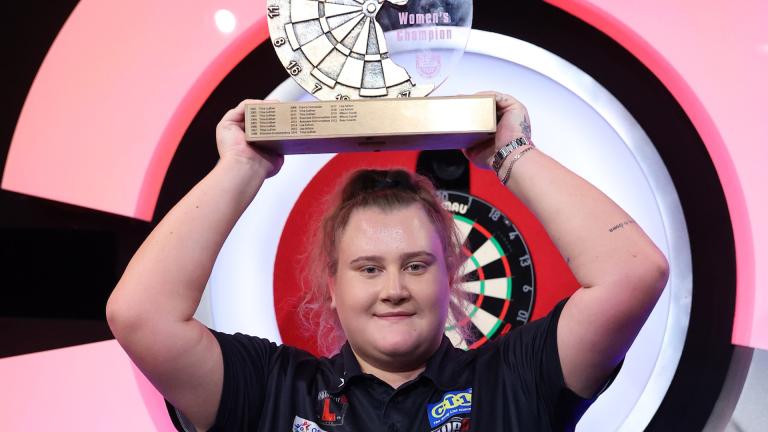 Beau Greaves lifts the trophy in 2023