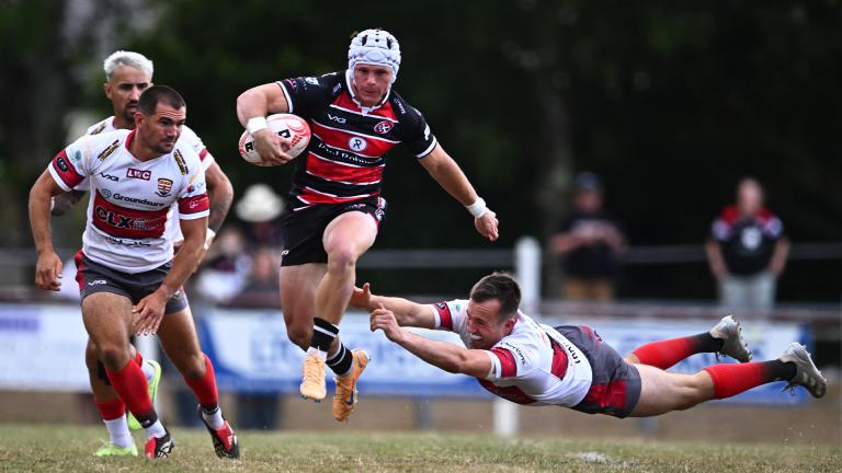 Henry Palmer evades a tackler